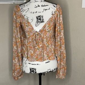 610 - Daisy and Delilah NWT Orange Floral Long Sleeve Crop Top, Size Medium